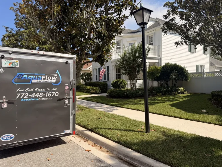 AquaFlow Pro Wash trailer at a house washing job